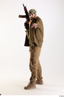 Andrew Elliott Insurgent Pointing holding gun standing whole body 0002.jpg
